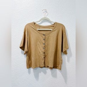 CAMEL SLOUCHY tee with raw hem seams and bronze buttons. Fits M-XL